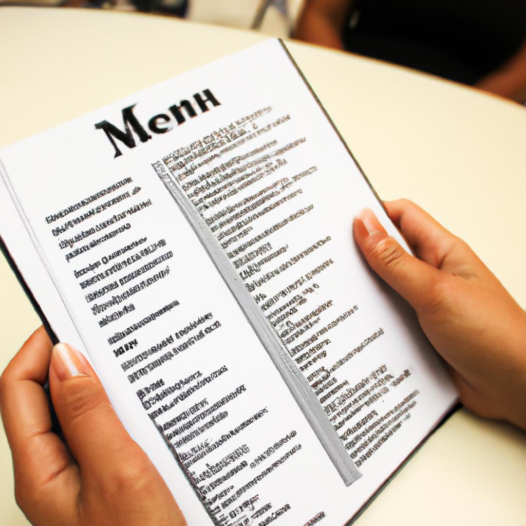 Person holding menu, making notes